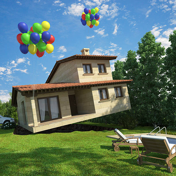 surreal scene of a house lifted to the sky by air ballons