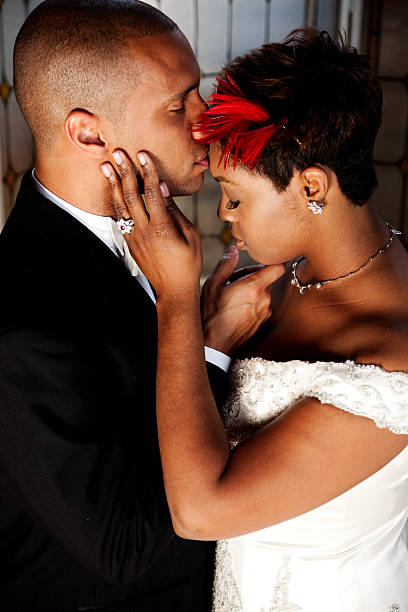 istock Ethnic Groom Kissing Forehead of Bride 176775961
