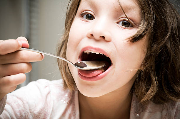 istock Little Girl Eating Ice Cream, Big Bite! 176776571