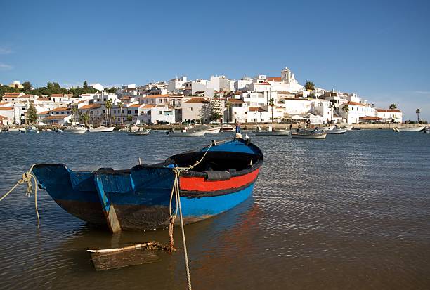 istock Ferragudo with fishing boat 176776912