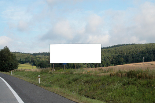 Blank advertising board on a roadside. You can find my other similar photos