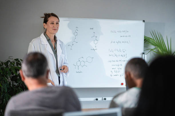 istock Female teacher teaching nontraditional students at university. Back to school. Pharmacy class. 1767770687