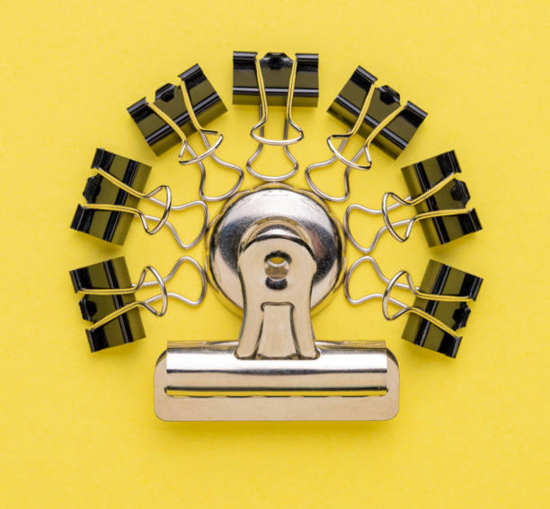 istock Bulldog Clips on Yellow 1767786990