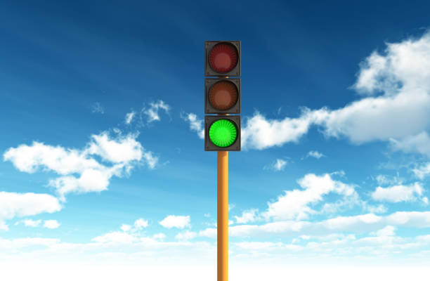 istock Green Traffic Light against Blue Sky Backgrounds 176779781