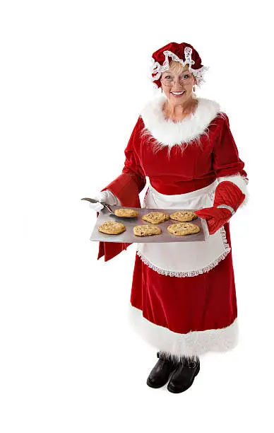 Mrs. Clause offers you a fresh baked chocolate chip cookie.