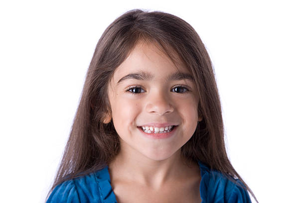 istock Young Hispanic Girl with a Toothy Smile 176780411