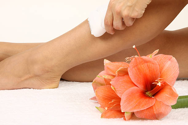 istock Pedicured feet  with beautiful flowers 176780909