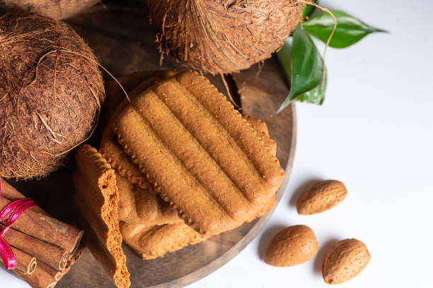 istock Cinnamon and coconut cookies on white background 1767811812