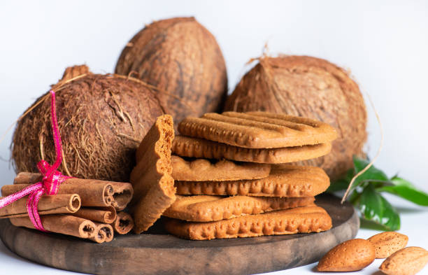 istock Cinnamon and coconut cookies on white background 1767812243