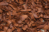 Grated chocolate. Chocolate pieces background