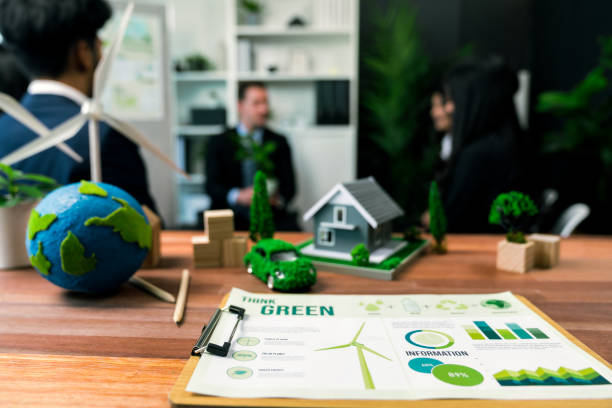 istock EV car model with mockup wind turbine on blurred background meeting. Quaint 1767841588
