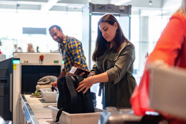 istock Hispanic Female Passenger Collecting Passport With Boarding Passes And A Black Backpack 1767844445