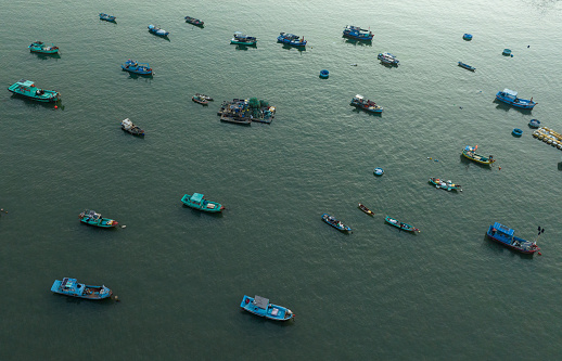 Aerial photo of boats and ships moored together at Front beach of Vung Tau city, Ba Ria Vung Tau province