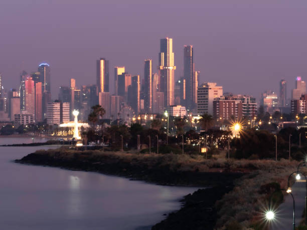 Melbourne  skyline and Port Philip Bay at sunrise from Elwood