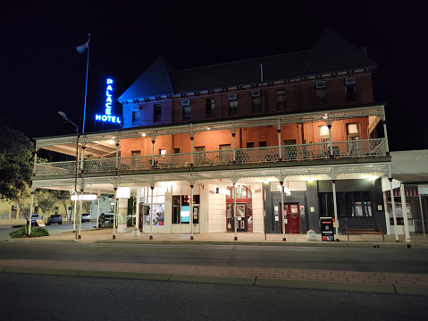 The Palace Hotel at night, a heritage-listed pub in Broken Hill, New South Wales, Australia. The 1994 Australian comedy-drama film, The Adventures of Priscilla, Queen of the Desert, filmed many of its Broken Hill scenes in the Palace Hotel.