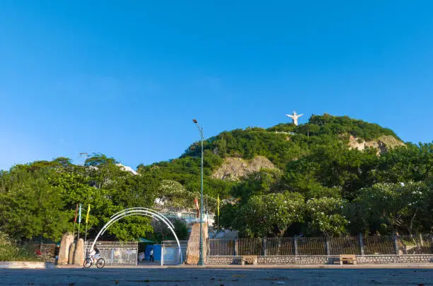 Photo of Tao Phung mountain and statue of Christ standing with arms outstretched, Vung Tau city, Ba Ria Vung Tau province
