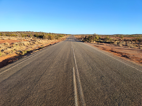 Road through the desert in Broken Hill, a city in the far west region of outback New South Wales, Australia.