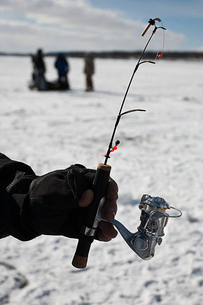 istock Ice fishing 176788432
