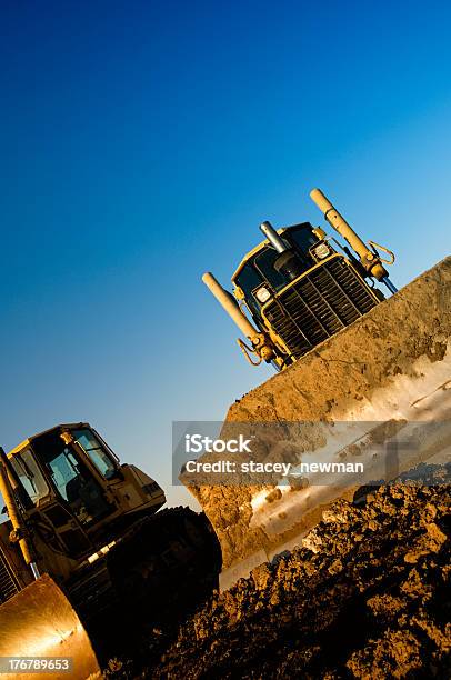 Construction Equipment Vehicles From Below Stock Photo - Download Image Now - Bulldozer, Construction Equipment, Construction Industry