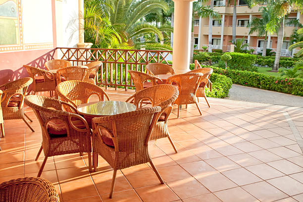 istock Brown wooden chairs an tables on patio 176789772