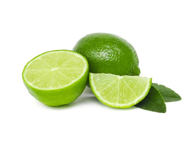 istock Fresh green lemons and lime leaves  placed on a white background. 1767904775