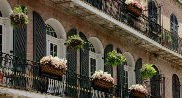 istock hanging plant baskets and planter boxes on a building in new orleans 1767905284