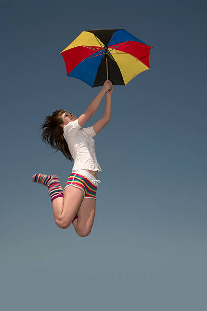 istock Girl with a umbrella 176791412