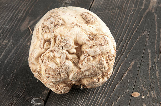 istock Root of Celery on a wooden table 176792964