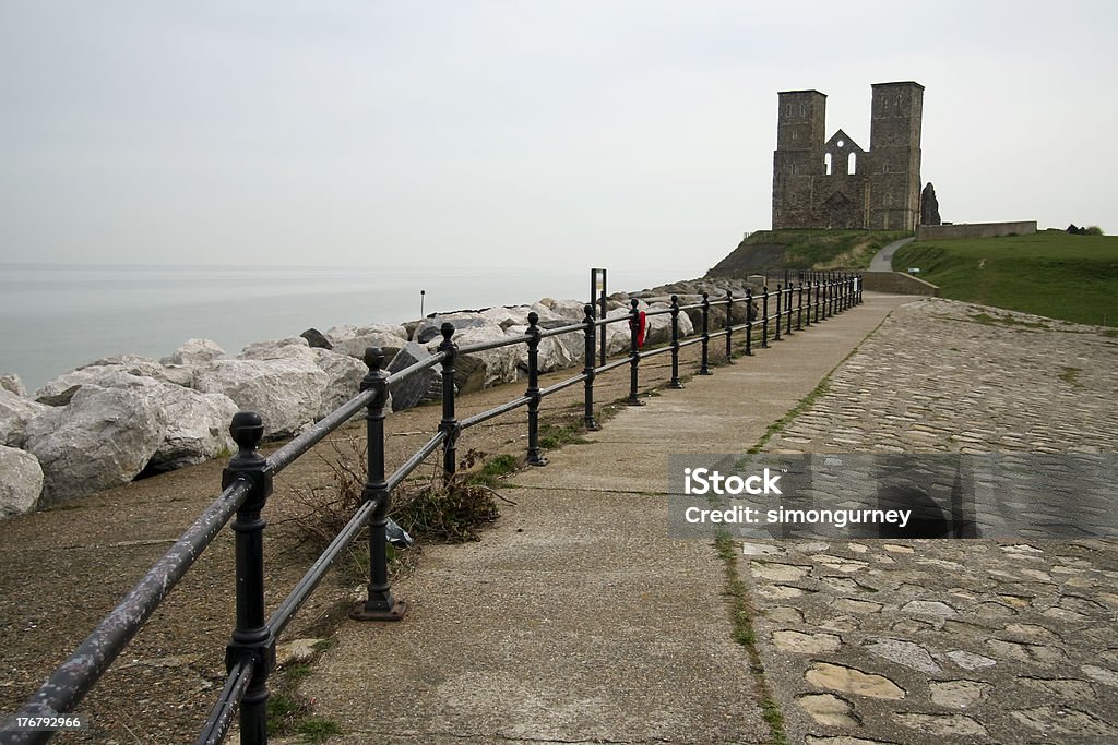 reculver towers herne bay sea defenses reculver towers roman saxon shore fort and remains of 12th century church undercut by coastal erosion Ancient Stock Photo