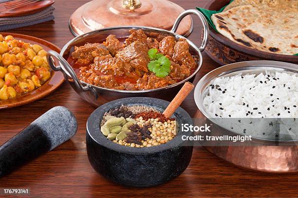 Indian Food Lamb Rogan Josh Curry Spice Selection Stock Photo - Download Image Now - Basmati Rice, Chapatti, Chick-Pea