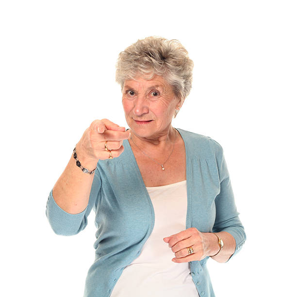 istock Senior older woman pointing 176793346