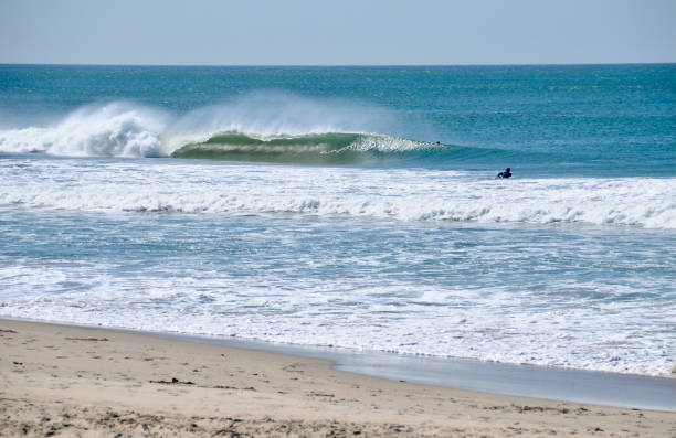 istock Wave Breaking in Newport Beach with Surfer Paddling Out 1767943083