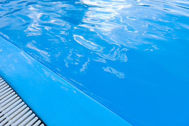 istock edge of swimming pool 176795936
