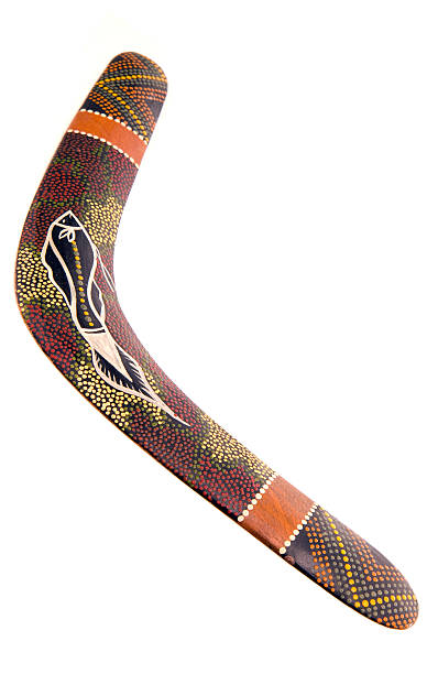 australian boomerang isolato su bianco - aborigine australian culture boomerang isolated foto e immagini stock
