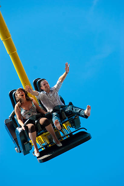 istock Couple riding on the attraction 176796811