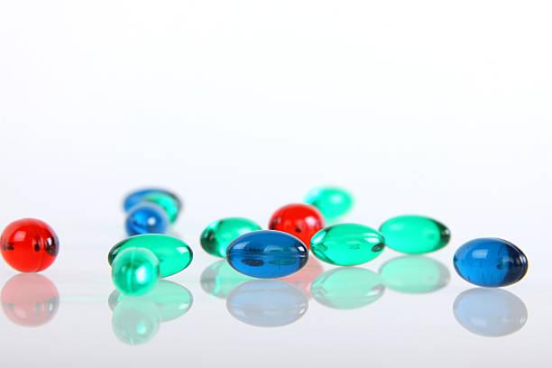 istock Many colours of gel pills 176797048