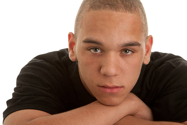 istock Mixed Race Teenage Boy With Serious Expression 176797285