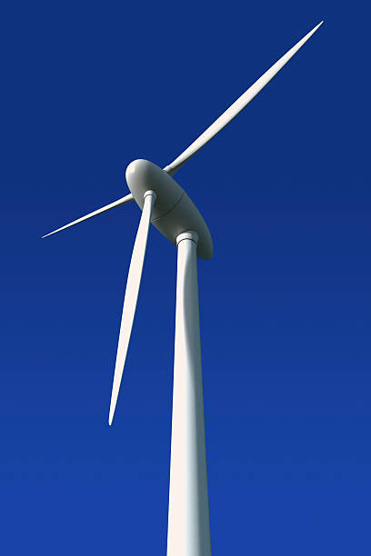 istock Wind turbine against a blue background 176797588