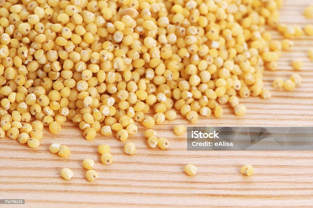 Millet seeds Millet seeds on a wooden background Beauty Stock Photo