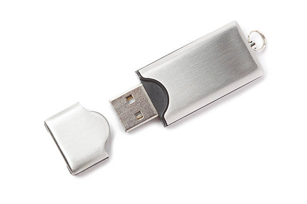 Silver USB flash drive with open lid on white background USB flash drive isolated on white backgroundSimilar images in my portfolio: usb stick photos stock pictures, royalty-free photos & images