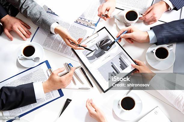 Hands Pointing To Graphs During Explanation Stock Photo - Download Image Now - Business, Business Meeting, Business Person