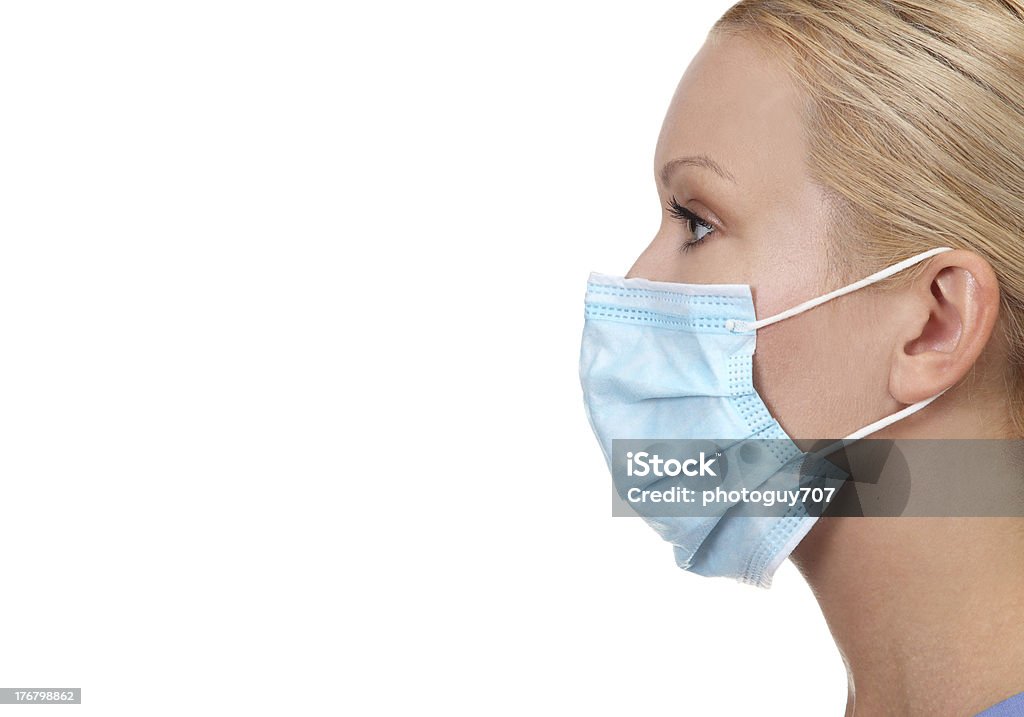 プロファイル画像の若い女性の看護師 - 安全衛��生保護具 マスクのロイヤリティフリーストックフォト