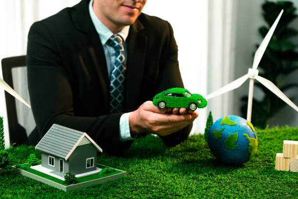 istock Businessman or CEO holding paper globe in office. Quaint 1767991605