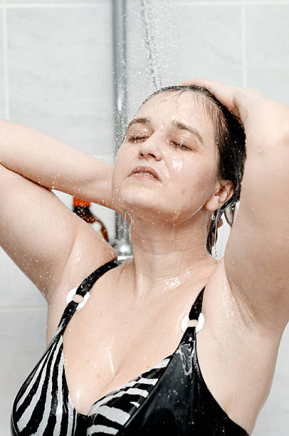 istock woman in the shower 176799165