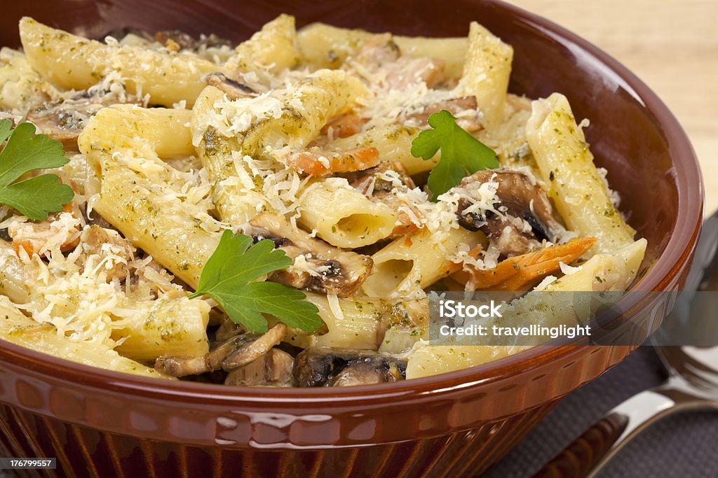 Pasta Bake with Mushrooms and Tuna "Pasta bake with creamy pesto sauce, mushrooms, tuna and parmesan. For MORE pasta images, please click" Baking Stock Photo