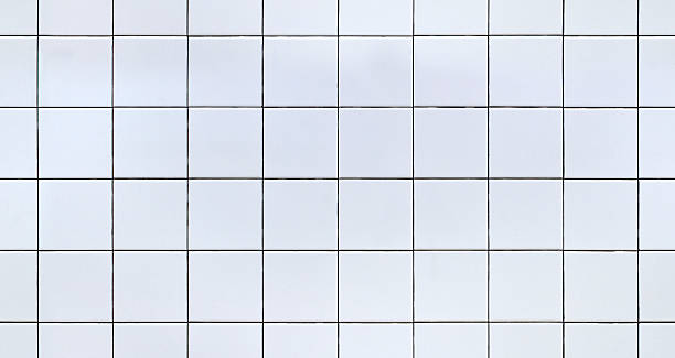 Seamless White Ceramic Tile White Ceramic or Porcelain Tile for use in renderings or as a background. Image can be tiled together for a seamless image. porcelain photos stock pictures, royalty-free photos & images