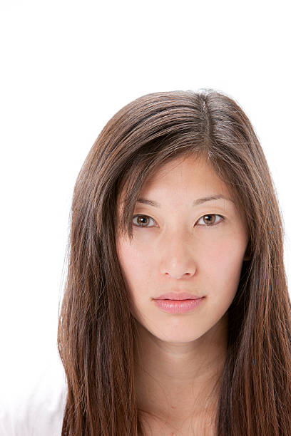 istock Asian Woman with Serious Expression Closeup Headshot 176801044