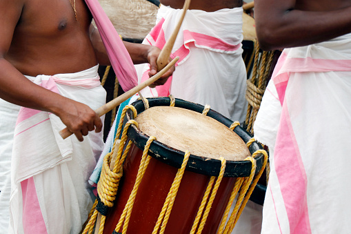 Indian Men Play Traditional Percussion Instrument In Kochi Kerala