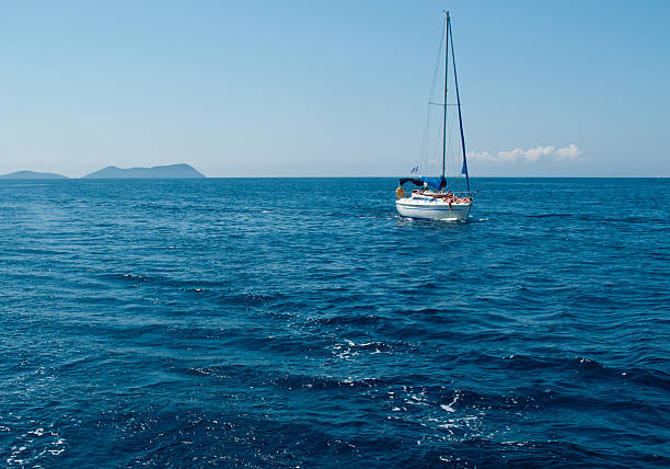 istock White yacht sailing on calm sea 176803461
