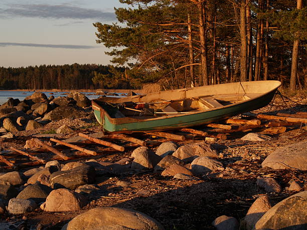 istock Boat on Cape Pedassaare at sunrise 176803988